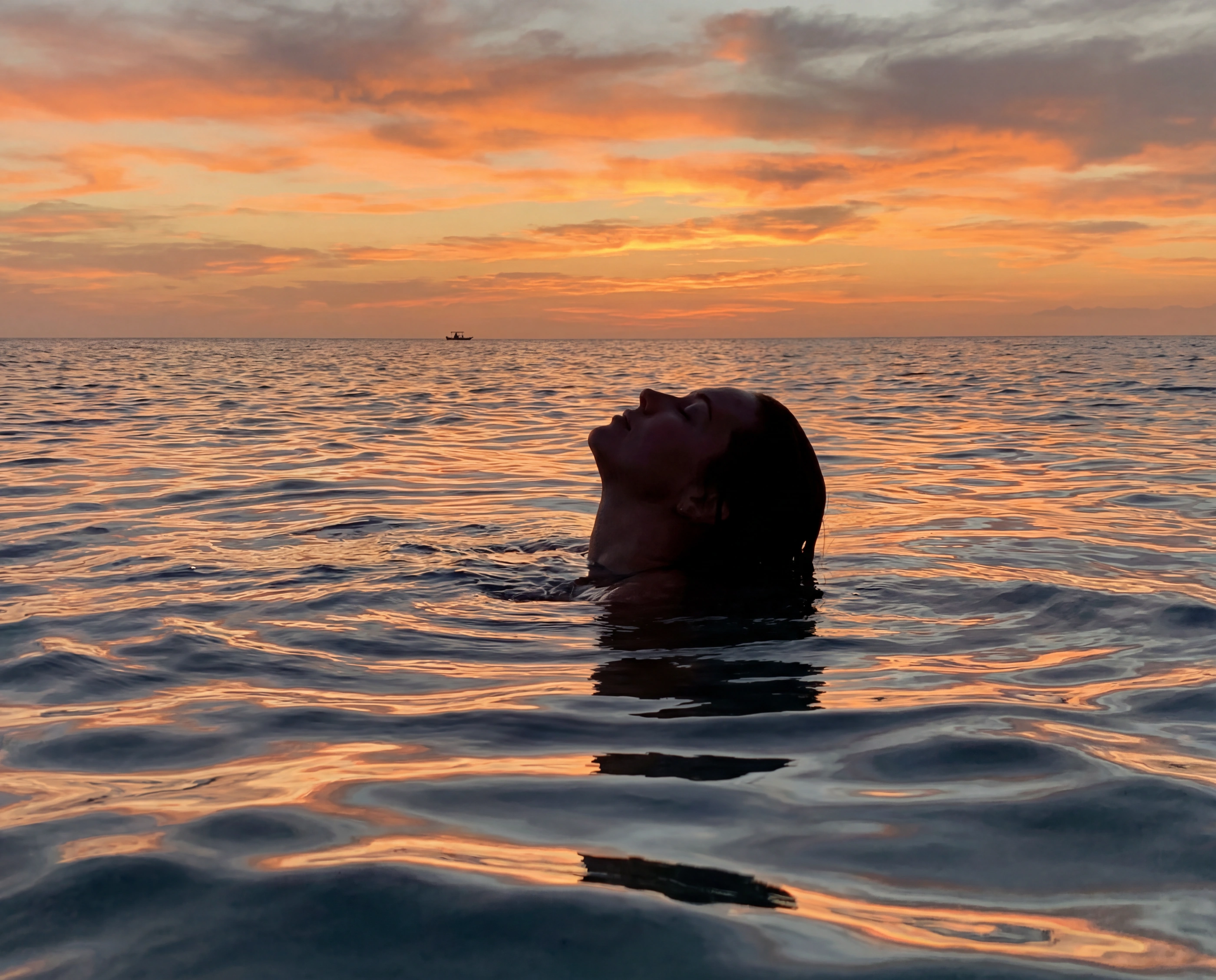 woman swimming sea sunset
