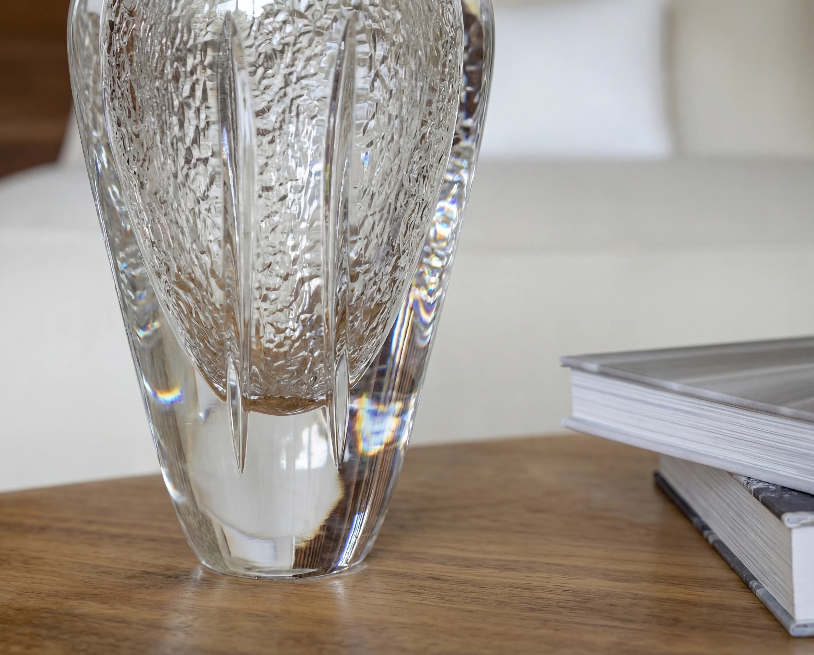 glass vase wood table book