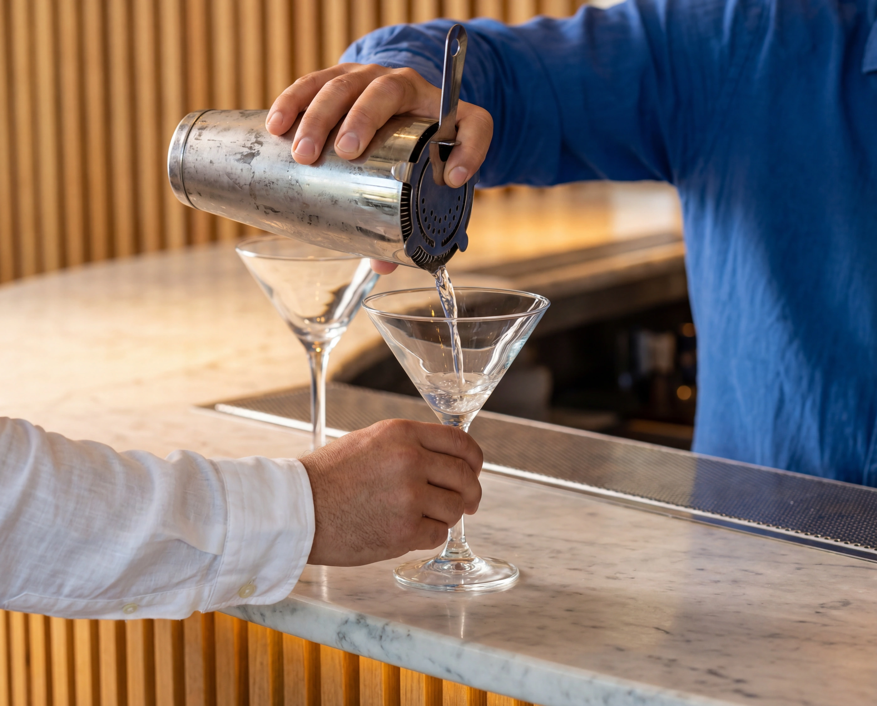 bartender pouring martini slat